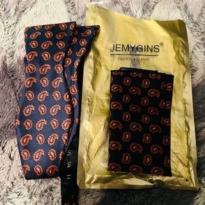 Men’s bow tie and pocket square, paisley pattern, navy and orange, brand new.